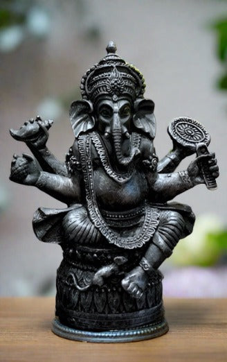 Unique Four hands Ganapati Pappa